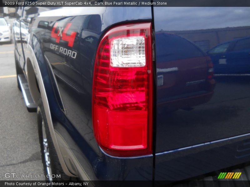 Dark Blue Pearl Metallic / Medium Stone 2009 Ford F250 Super Duty XLT SuperCab 4x4