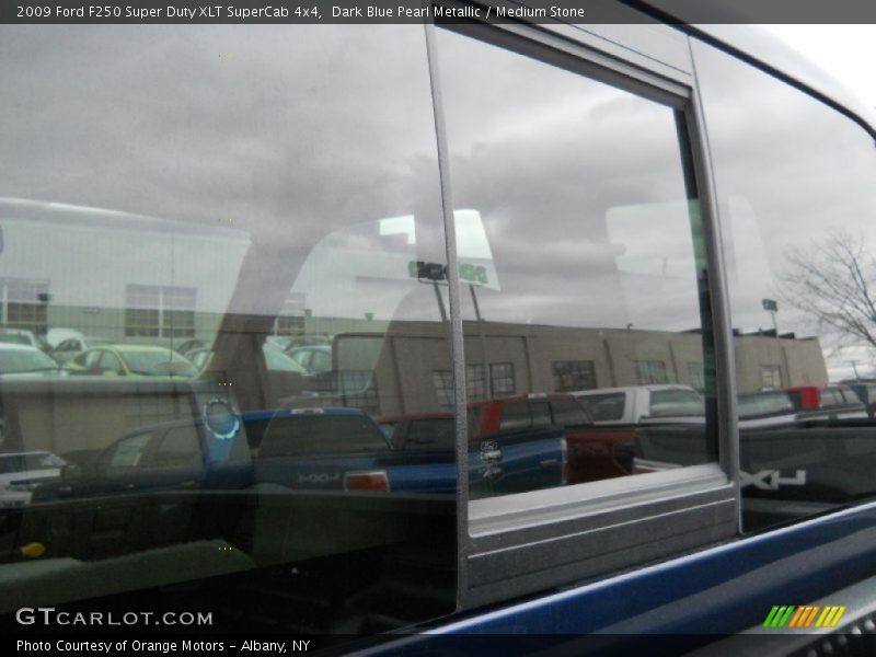 Dark Blue Pearl Metallic / Medium Stone 2009 Ford F250 Super Duty XLT SuperCab 4x4