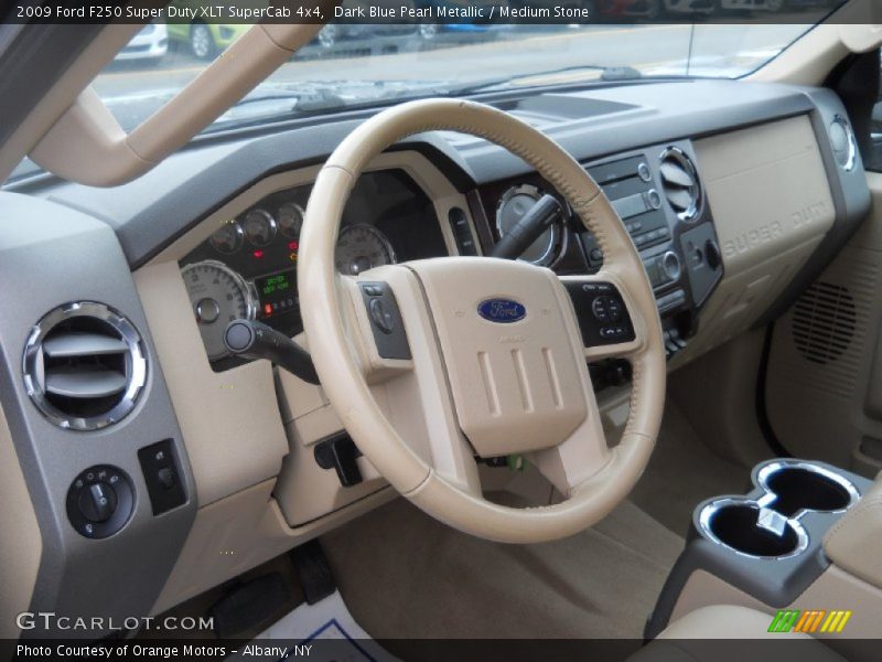 Dark Blue Pearl Metallic / Medium Stone 2009 Ford F250 Super Duty XLT SuperCab 4x4