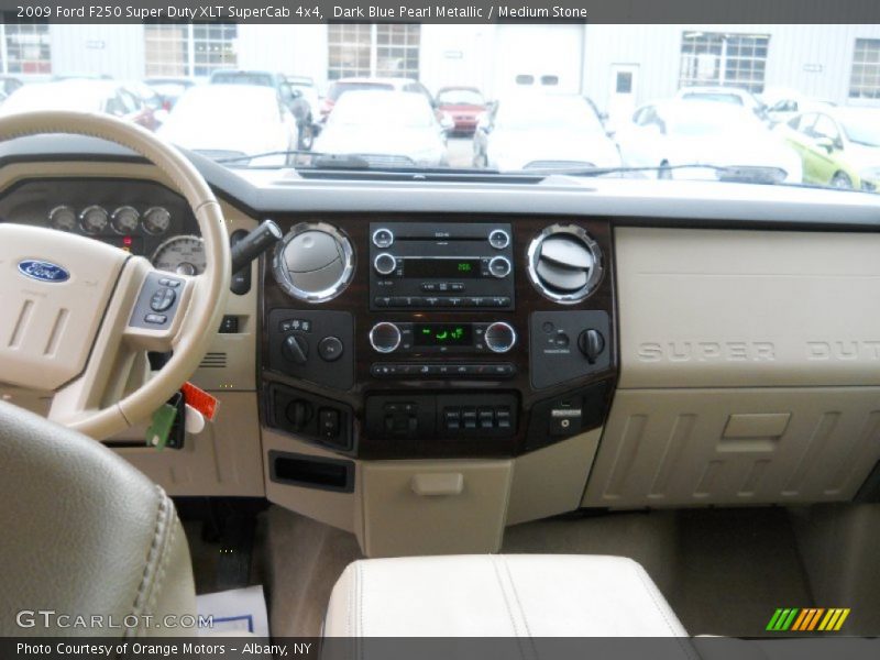 Dark Blue Pearl Metallic / Medium Stone 2009 Ford F250 Super Duty XLT SuperCab 4x4