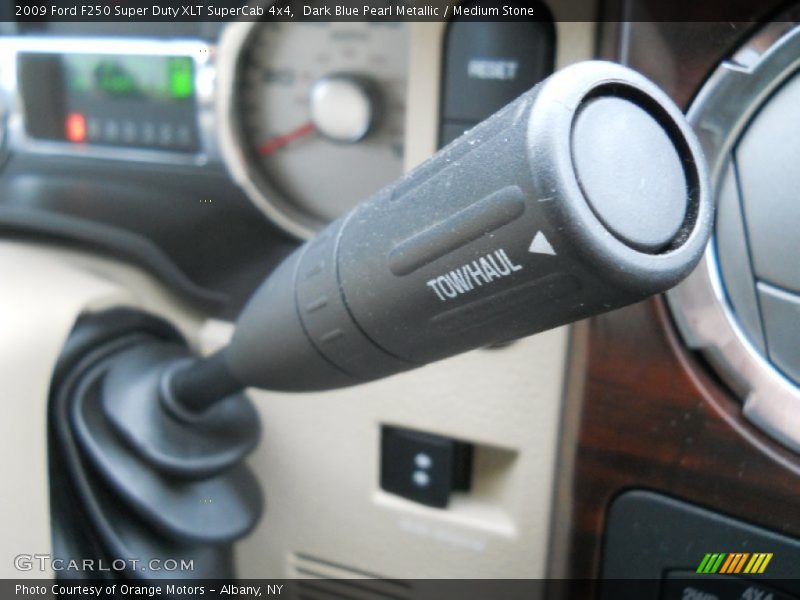 Dark Blue Pearl Metallic / Medium Stone 2009 Ford F250 Super Duty XLT SuperCab 4x4