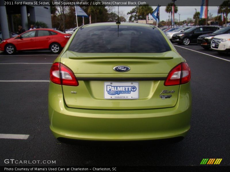 Lime Squeeze Metallic / Light Stone/Charcoal Black Cloth 2011 Ford Fiesta SE Sedan