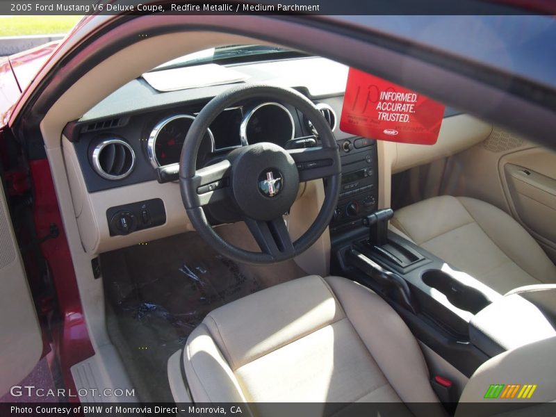 Redfire Metallic / Medium Parchment 2005 Ford Mustang V6 Deluxe Coupe