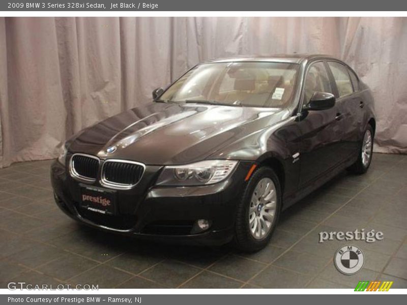 Jet Black / Beige 2009 BMW 3 Series 328xi Sedan