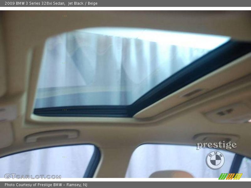 Jet Black / Beige 2009 BMW 3 Series 328xi Sedan