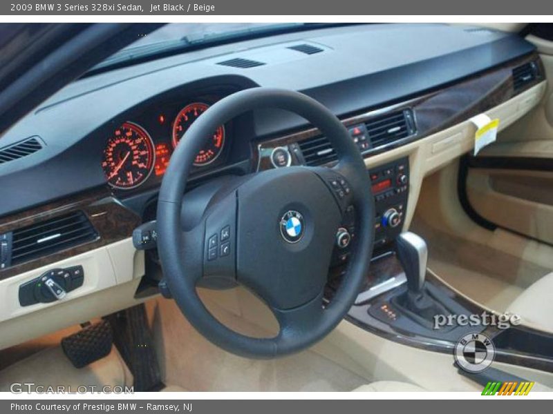 Jet Black / Beige 2009 BMW 3 Series 328xi Sedan