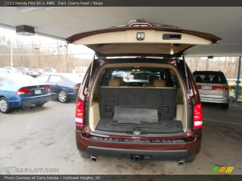 Dark Cherry Pearl / Beige 2011 Honda Pilot EX-L 4WD