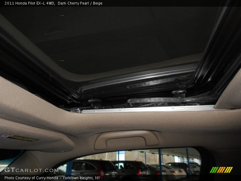 Dark Cherry Pearl / Beige 2011 Honda Pilot EX-L 4WD