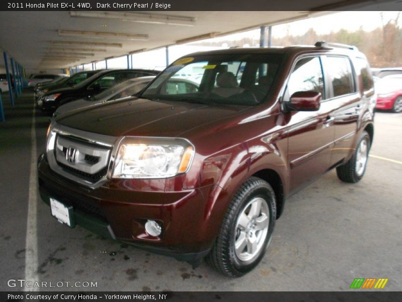 Dark Cherry Pearl / Beige 2011 Honda Pilot EX-L 4WD