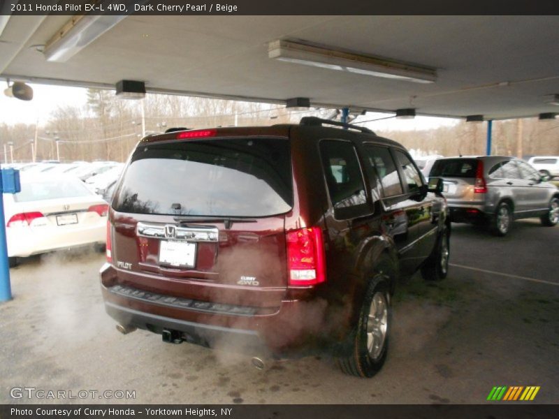 Dark Cherry Pearl / Beige 2011 Honda Pilot EX-L 4WD
