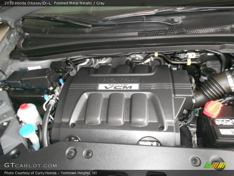 Polished Metal Metallic / Gray 2010 Honda Odyssey EX-L