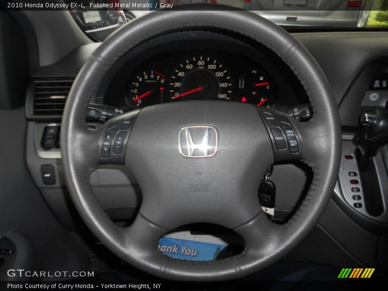 Polished Metal Metallic / Gray 2010 Honda Odyssey EX-L