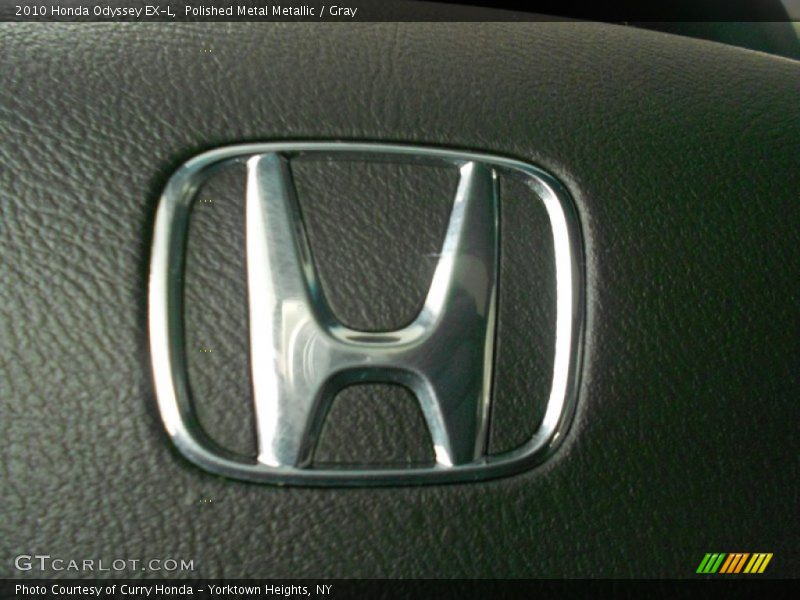 Polished Metal Metallic / Gray 2010 Honda Odyssey EX-L