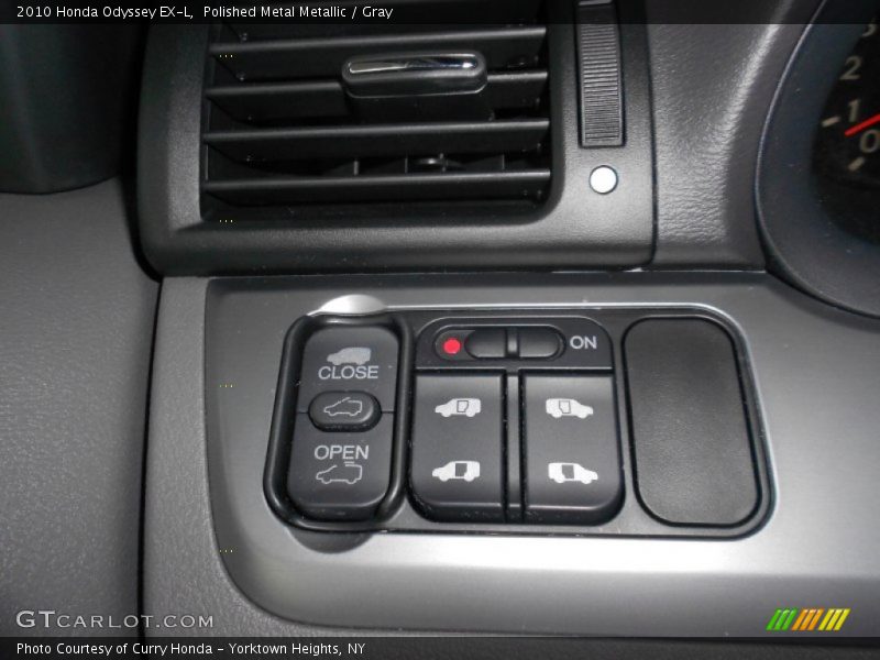 Polished Metal Metallic / Gray 2010 Honda Odyssey EX-L