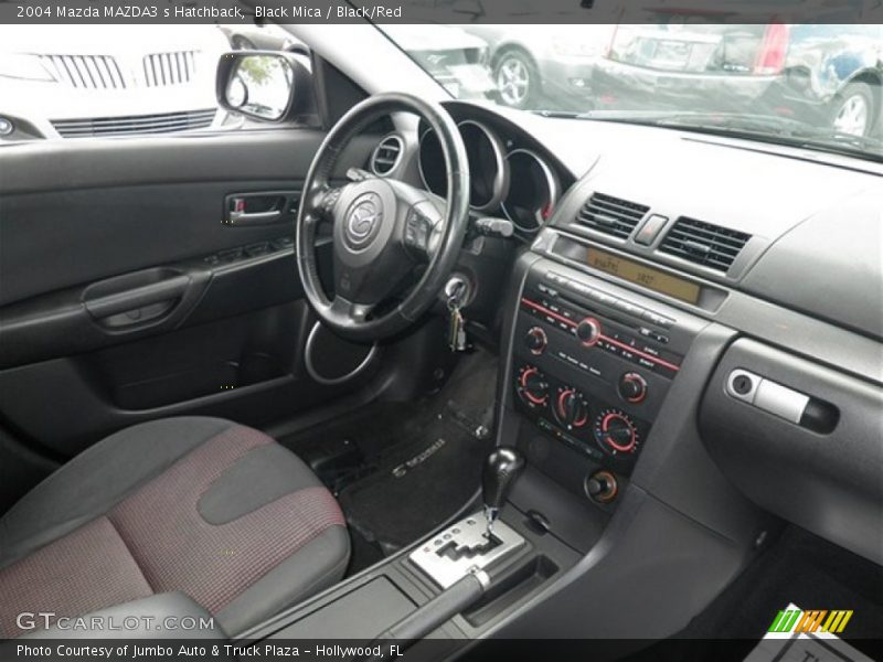 Dashboard of 2004 MAZDA3 s Hatchback