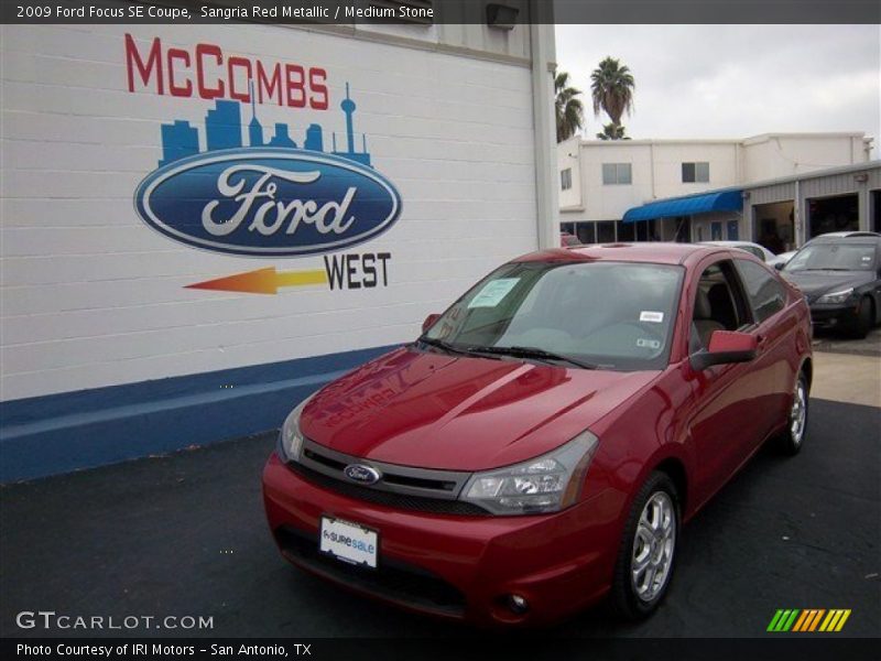 Sangria Red Metallic / Medium Stone 2009 Ford Focus SE Coupe