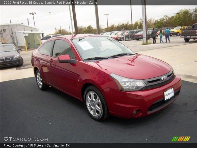 Sangria Red Metallic / Medium Stone 2009 Ford Focus SE Coupe