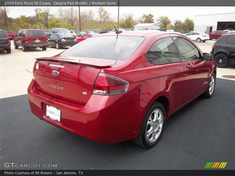 Sangria Red Metallic / Medium Stone 2009 Ford Focus SE Coupe