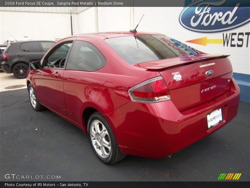 Sangria Red Metallic / Medium Stone 2009 Ford Focus SE Coupe