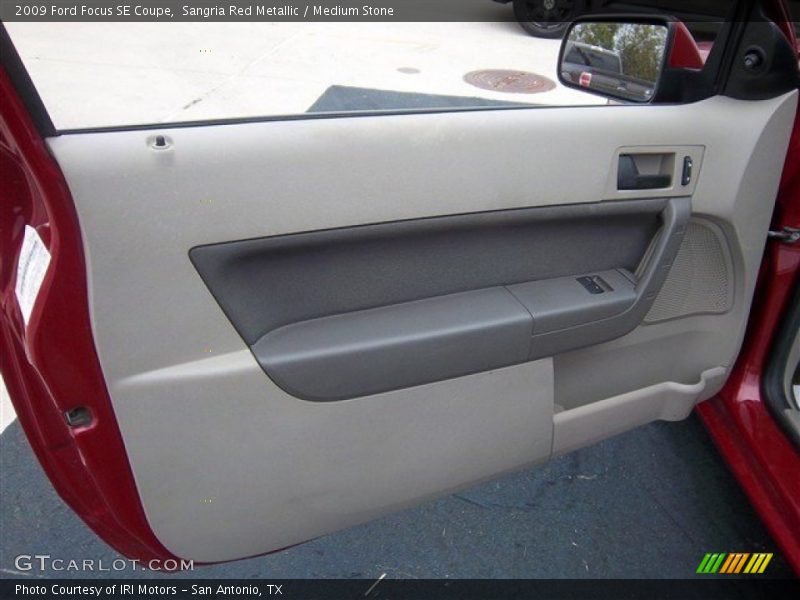 Sangria Red Metallic / Medium Stone 2009 Ford Focus SE Coupe