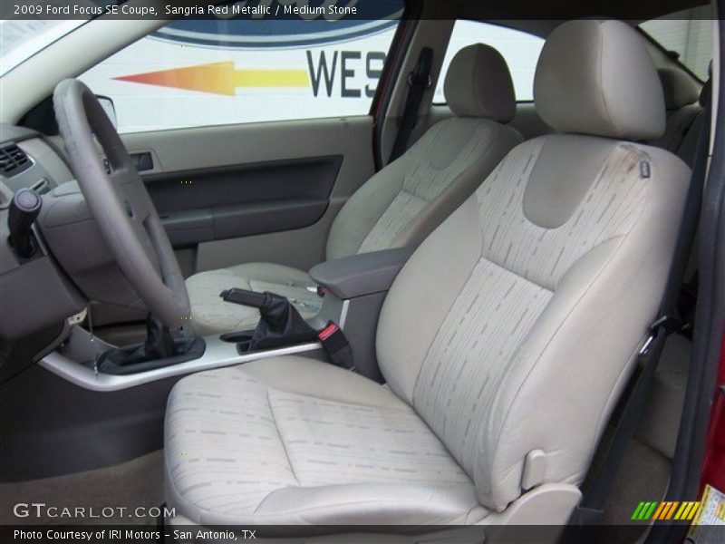 Sangria Red Metallic / Medium Stone 2009 Ford Focus SE Coupe