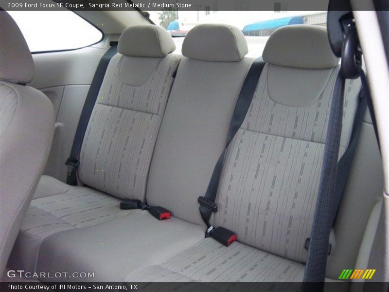 Sangria Red Metallic / Medium Stone 2009 Ford Focus SE Coupe