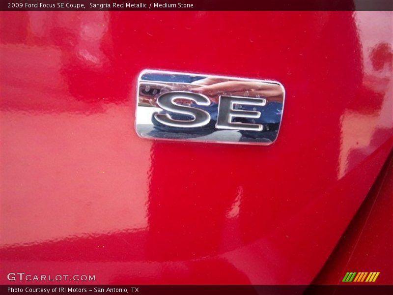 Sangria Red Metallic / Medium Stone 2009 Ford Focus SE Coupe