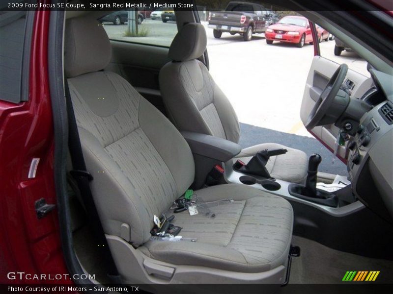 Sangria Red Metallic / Medium Stone 2009 Ford Focus SE Coupe