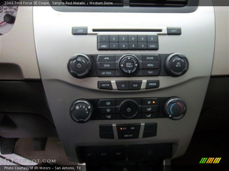 Sangria Red Metallic / Medium Stone 2009 Ford Focus SE Coupe