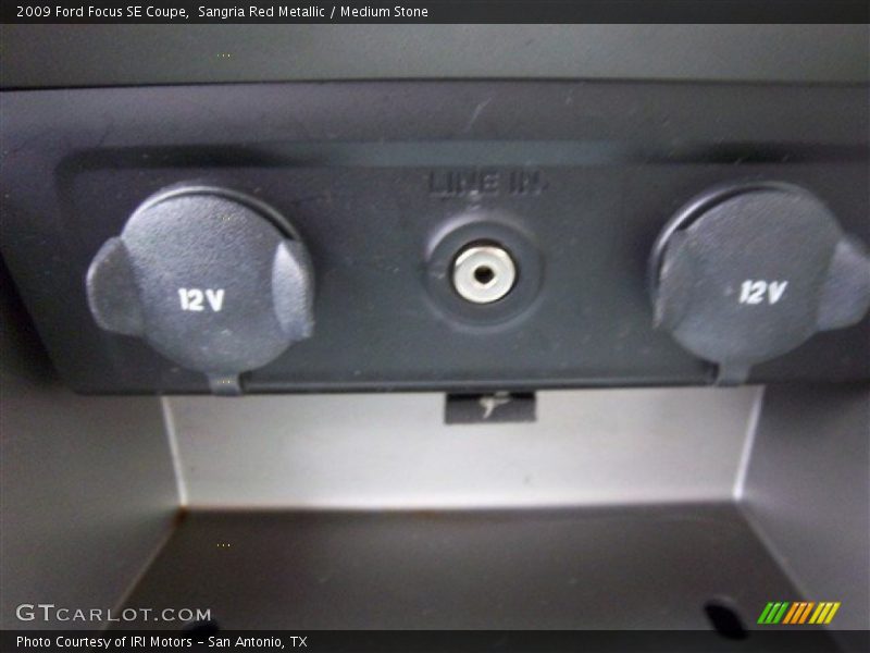Sangria Red Metallic / Medium Stone 2009 Ford Focus SE Coupe