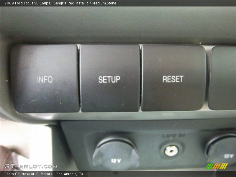 Sangria Red Metallic / Medium Stone 2009 Ford Focus SE Coupe