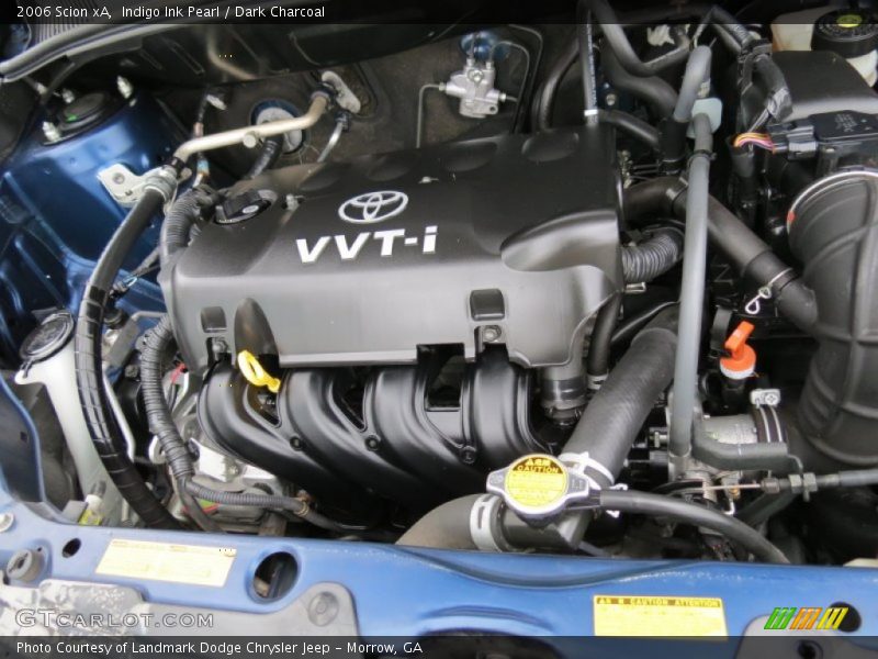 Indigo Ink Pearl / Dark Charcoal 2006 Scion xA