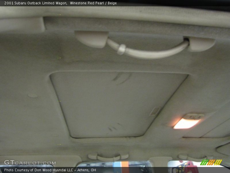Winestone Red Pearl / Beige 2001 Subaru Outback Limited Wagon
