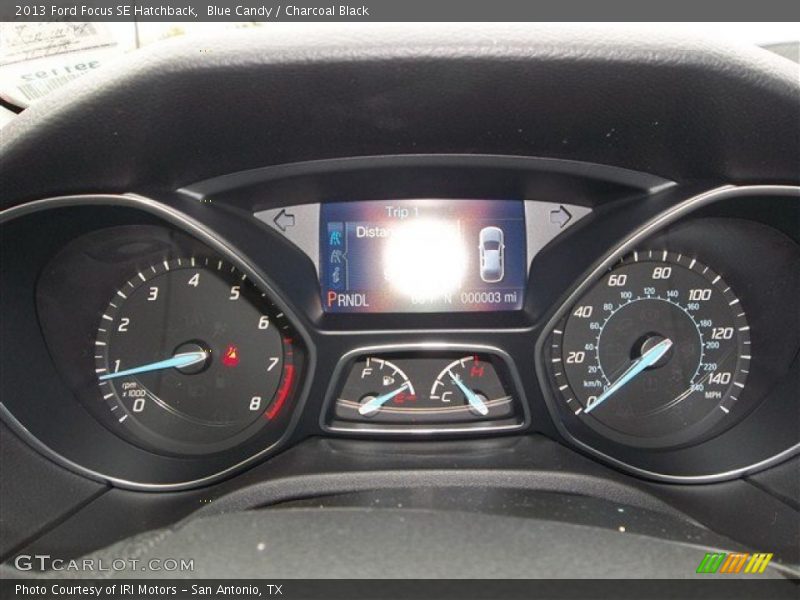 Blue Candy / Charcoal Black 2013 Ford Focus SE Hatchback