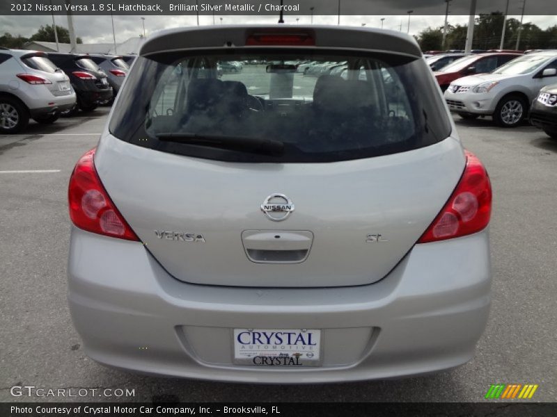 Brilliant Silver Metallic / Charcoal 2012 Nissan Versa 1.8 SL Hatchback
