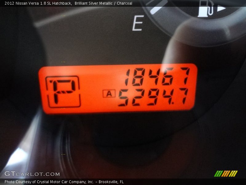 Brilliant Silver Metallic / Charcoal 2012 Nissan Versa 1.8 SL Hatchback