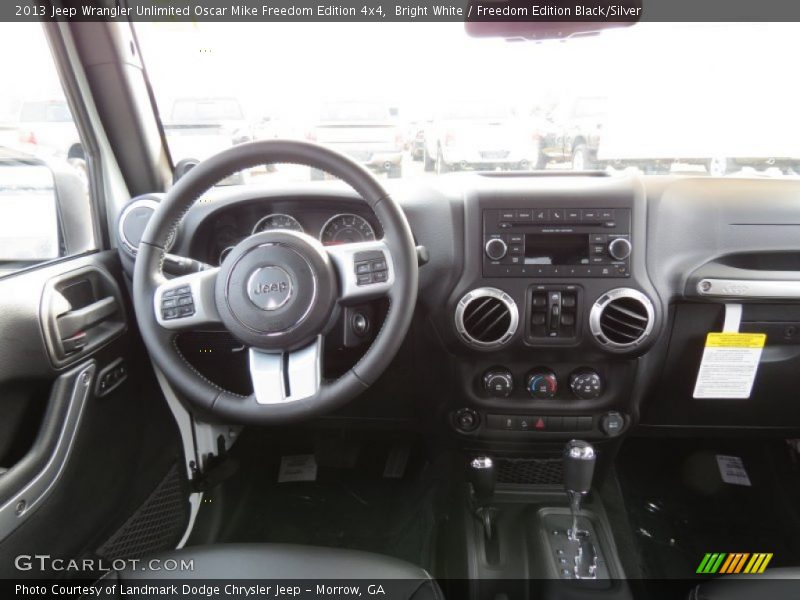 Dashboard of 2013 Wrangler Unlimited Oscar Mike Freedom Edition 4x4