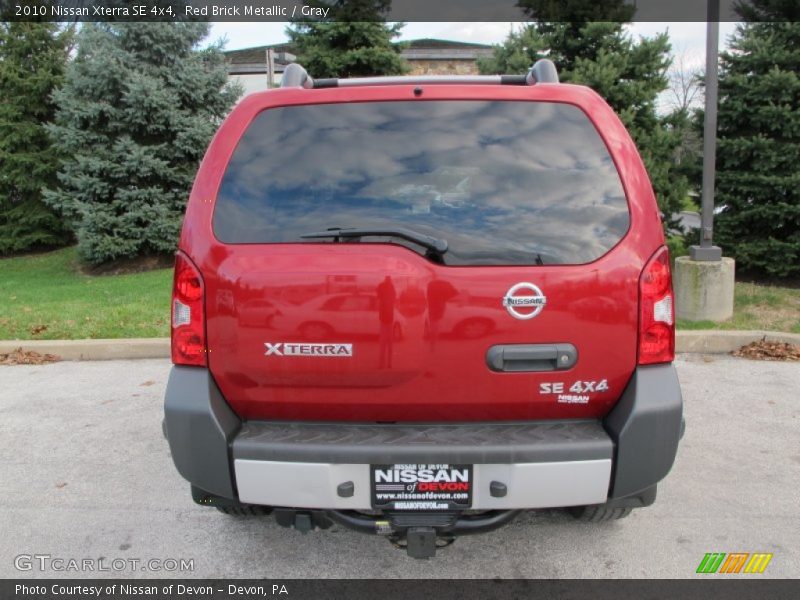 Red Brick Metallic / Gray 2010 Nissan Xterra SE 4x4