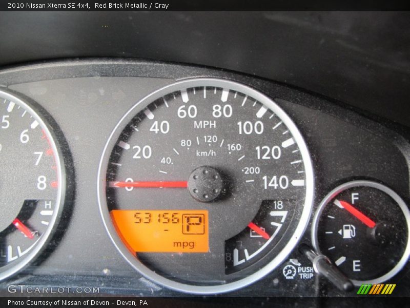 Red Brick Metallic / Gray 2010 Nissan Xterra SE 4x4
