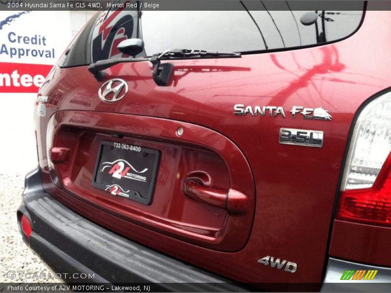 Merlot Red / Beige 2004 Hyundai Santa Fe GLS 4WD