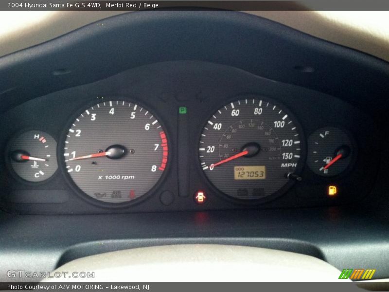 Merlot Red / Beige 2004 Hyundai Santa Fe GLS 4WD