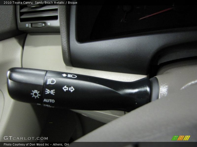 Sandy Beach Metallic / Bisque 2010 Toyota Camry