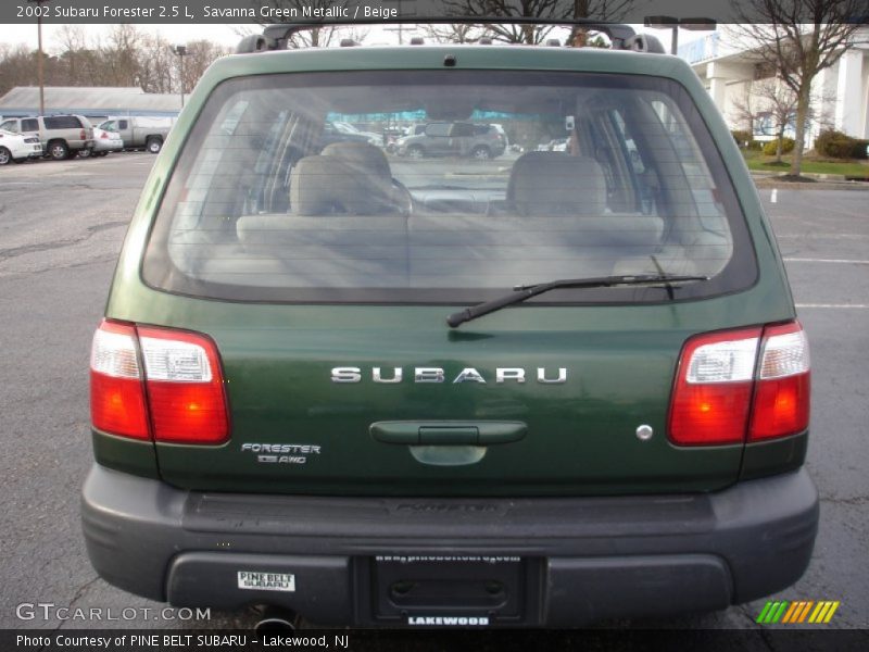 Savanna Green Metallic / Beige 2002 Subaru Forester 2.5 L