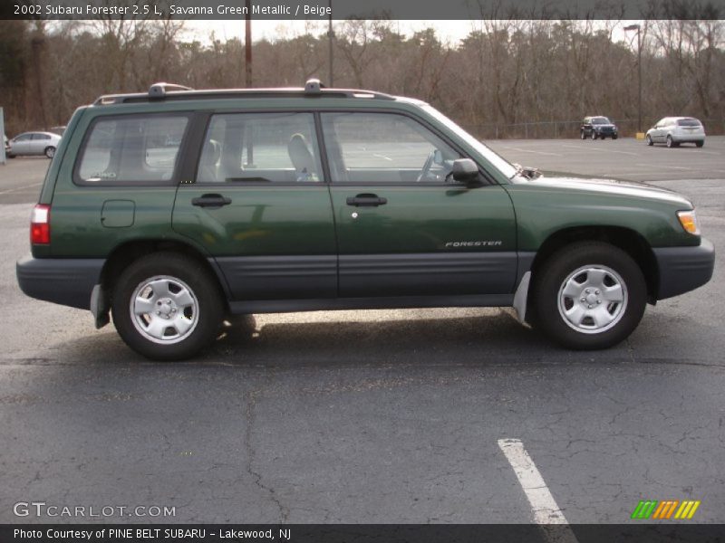 Savanna Green Metallic / Beige 2002 Subaru Forester 2.5 L