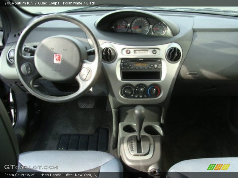 Polar White / Black 2004 Saturn ION 2 Quad Coupe