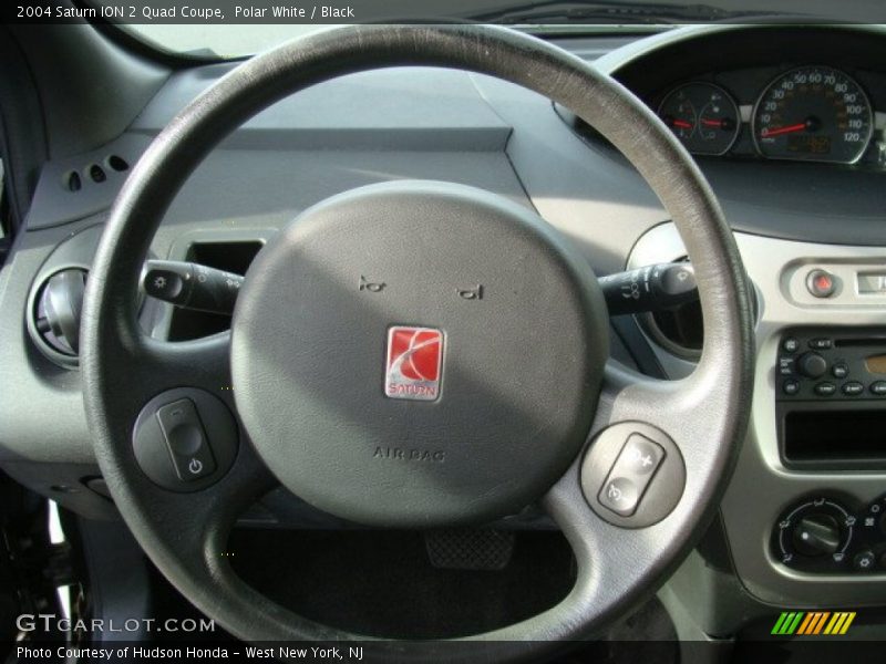 Polar White / Black 2004 Saturn ION 2 Quad Coupe