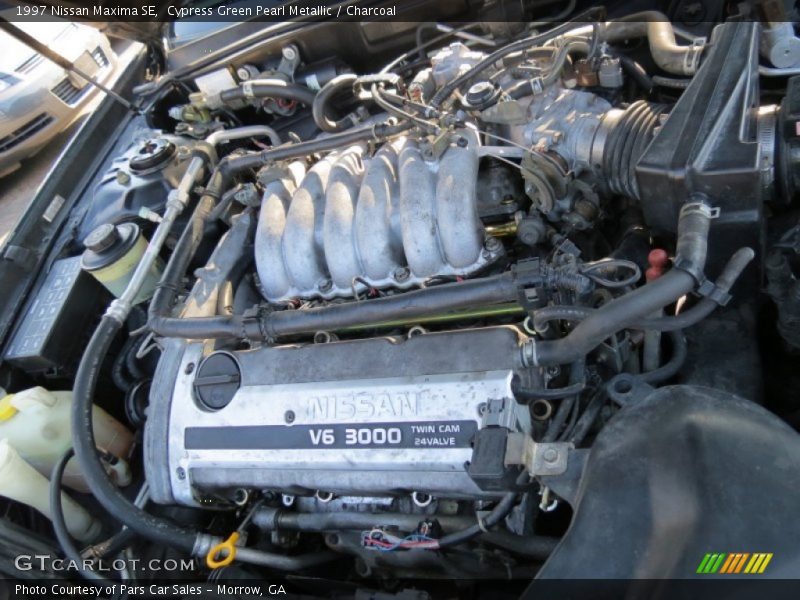 Cypress Green Pearl Metallic / Charcoal 1997 Nissan Maxima SE