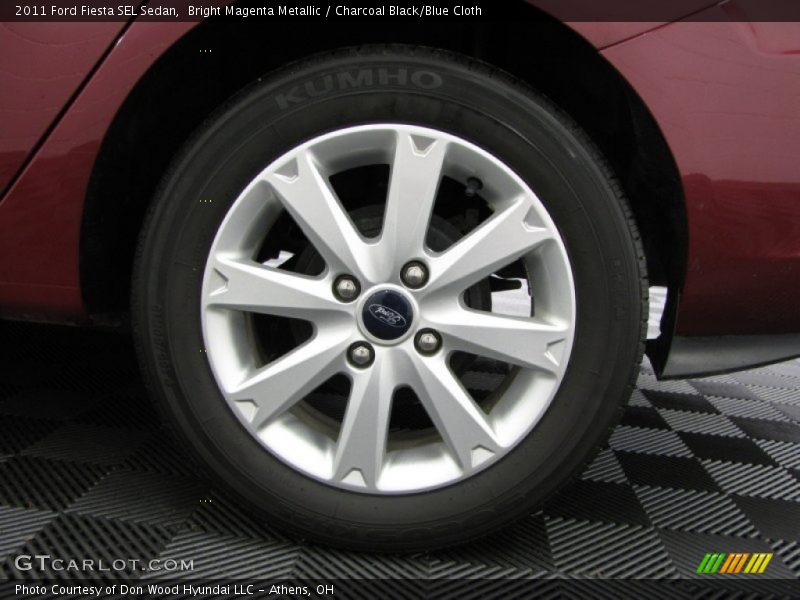 Bright Magenta Metallic / Charcoal Black/Blue Cloth 2011 Ford Fiesta SEL Sedan