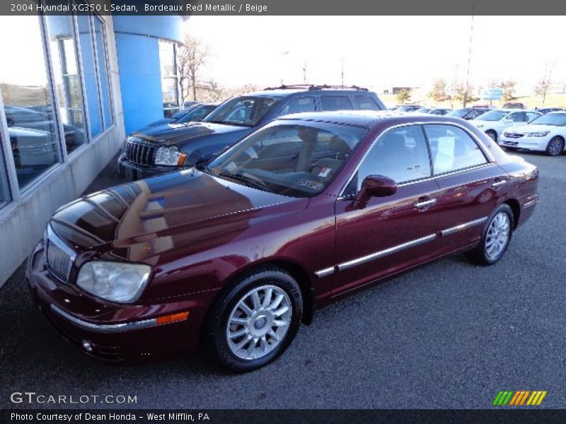 Front 3/4 View of 2004 XG350 L Sedan
