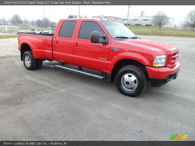 Front 3/4 View of 2004 F350 Super Duty XLT Crew Cab 4x4 Dually